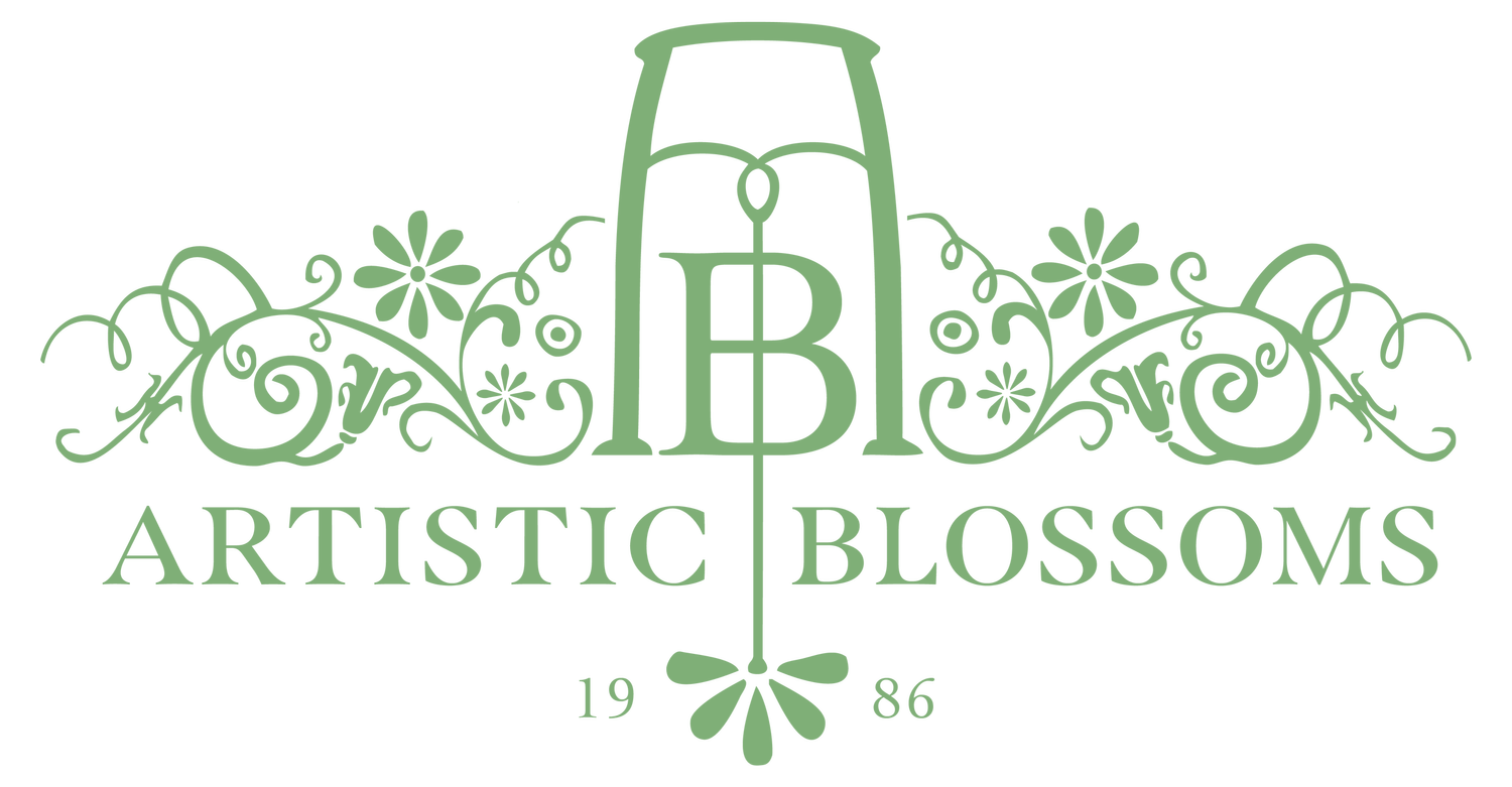 A decorative logo for Artistic Blossoms.